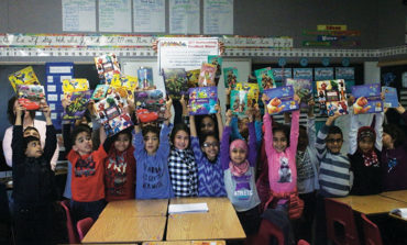 Dearborn Federation of Teachers donate books to DPS students