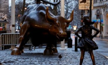 Statue of girl stares down Wallstreet’s bull in defiance on Women’s Day eve