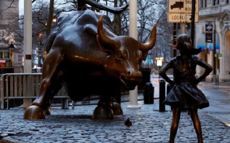 Statue of girl stares down Wallstreet’s bull in defiance on Women’s Day eve