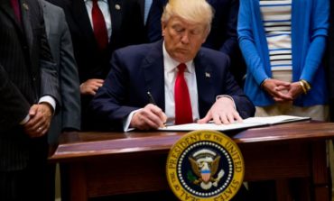 Trump signs order allowing tax-exempt churches to be involved in politics