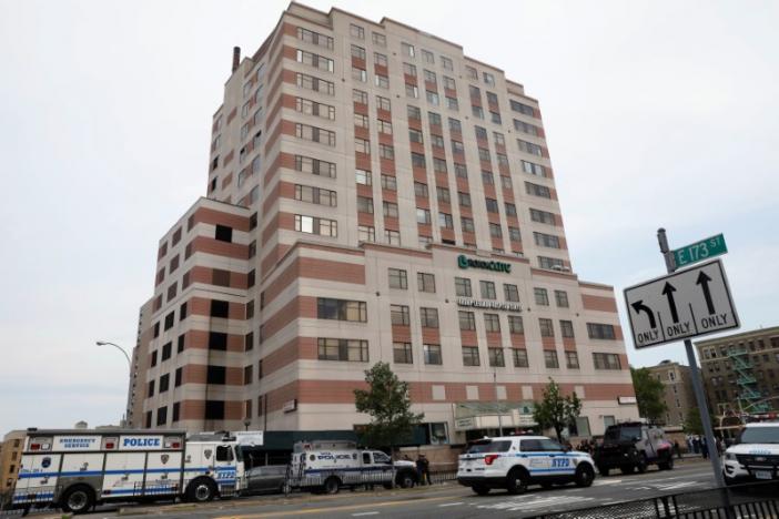 Gunman kills doctor, wounds six in a New York City hospital rampage
