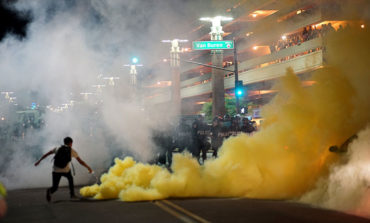 Police use pepper spray to disperse protesters at Trump's Phoenix rally