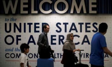 Airlines implement tougher U.S. security rules on incoming passengers