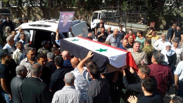 Mouners carry coffins of Syrian Druze victims massacred in Sweida by ISIS terrorists