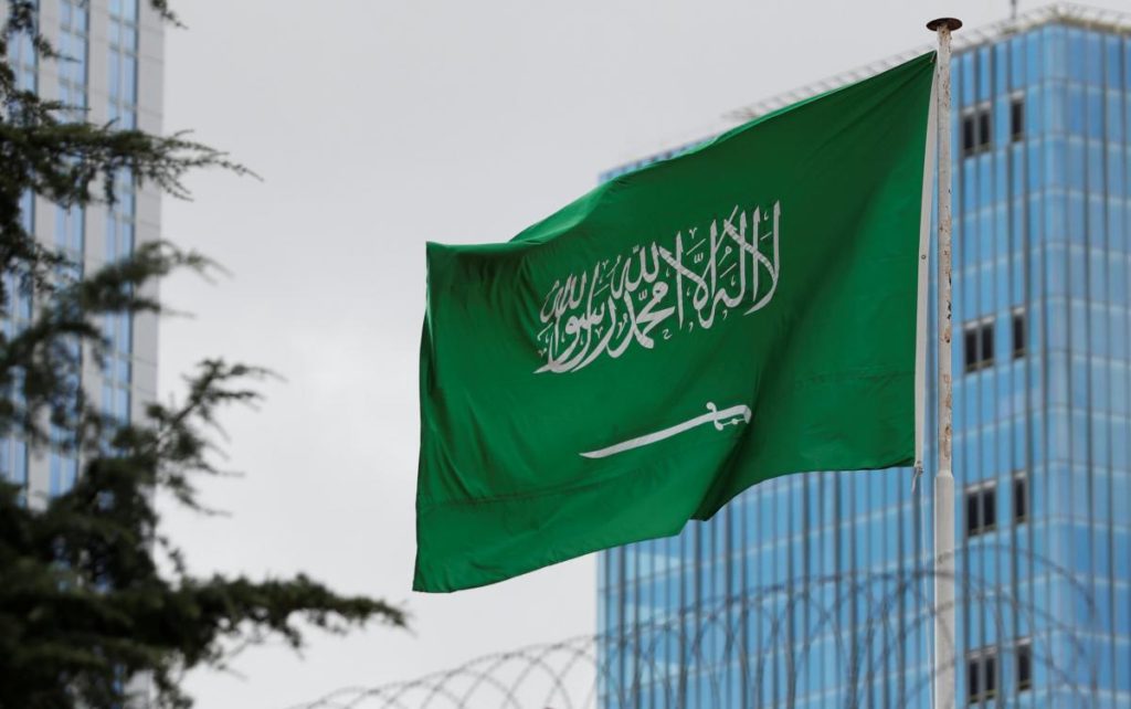 A Saudi flag flutters atop Saudi Arabia's consulate in Istanbul