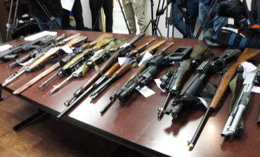 Police officers find weapons, ammo cache during check of licensed dealer