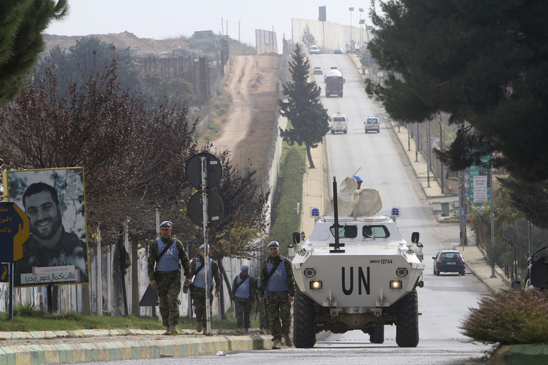 U.N peacekeepers patrol the Lebanese side of the Lebanese-Israeli border in the southern village of Kfar Kila, Lebanon, Tuesday, Dec. 4, 2018. 
