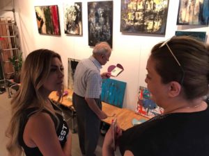 Rana Loutfi (left) showing her work in Beirut