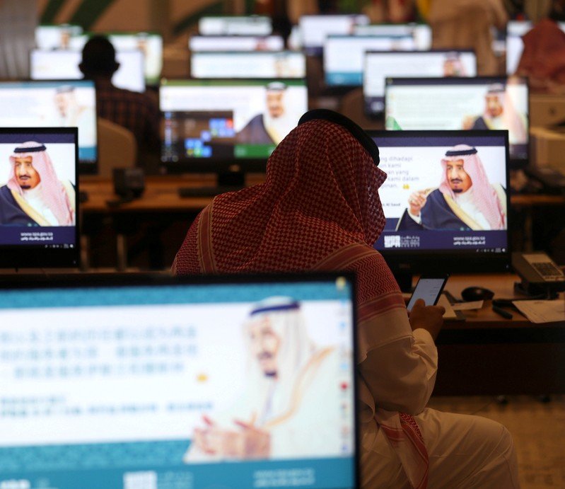 A Journalist uses his mobile at the media center during the 14th Islamic Summit in Mecca, Saudi Arabia May 30, 2019. REUTERS