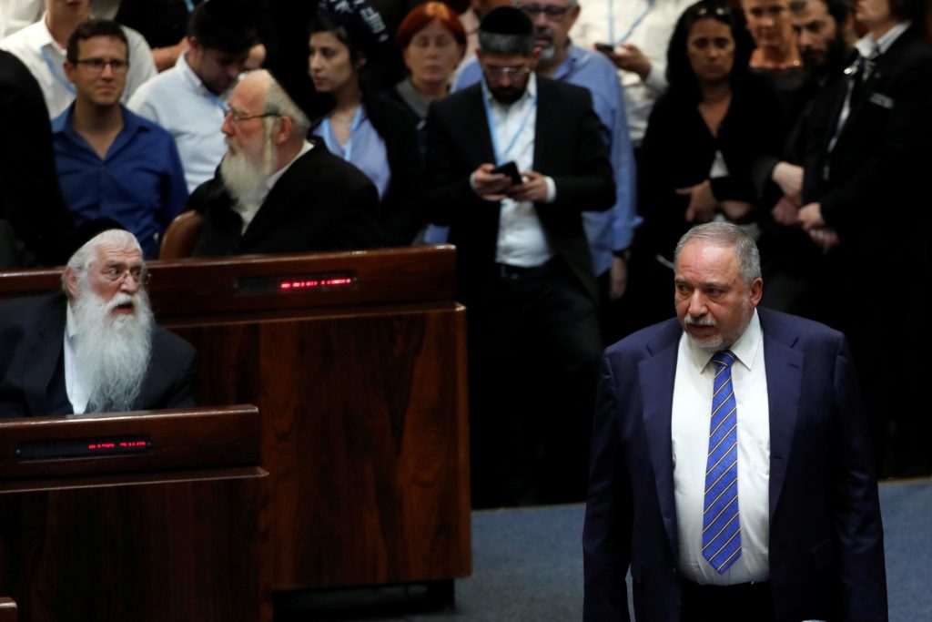 Former Israel’s Defense Minister Avigdor Lieberman stands at the Plenum at the Knesset on May 30. - Reuters