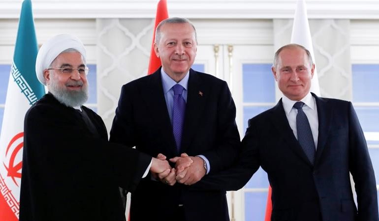 Putin hopes talks with Turkey, Iran could create conditions for final Syria crisis resolution
