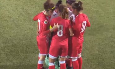 Jordanian soccer team huddles around opposing player during game so she can fix her hijab