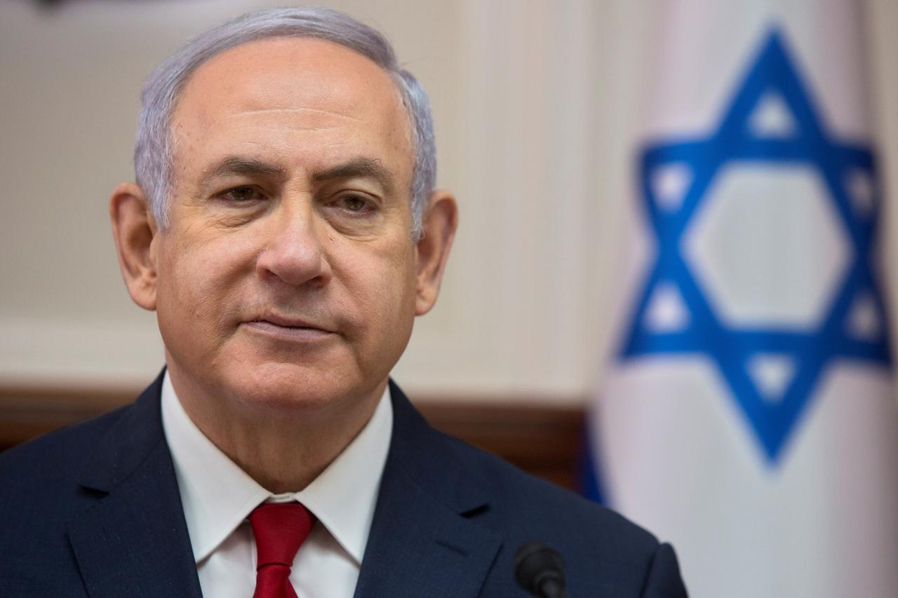 Netanyahu formally charged with corruption after dropping bid for immunity