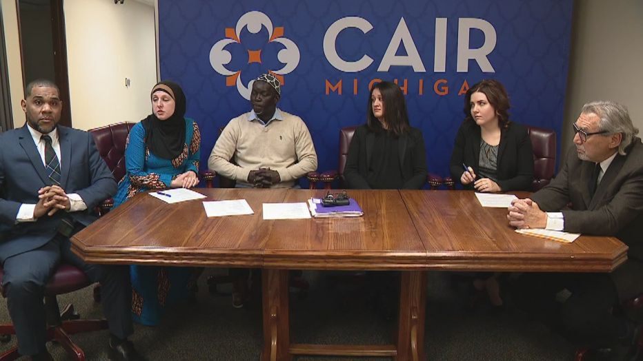 CAIR MI Executive Director Dawud Walid, CAIR attorney Amy Doukoure, plaintiffs / former co-workers Aliou Diao and Alicia Dunlap and their attorneys Channing Robinson and Michael Pitt. - Photo a video grab