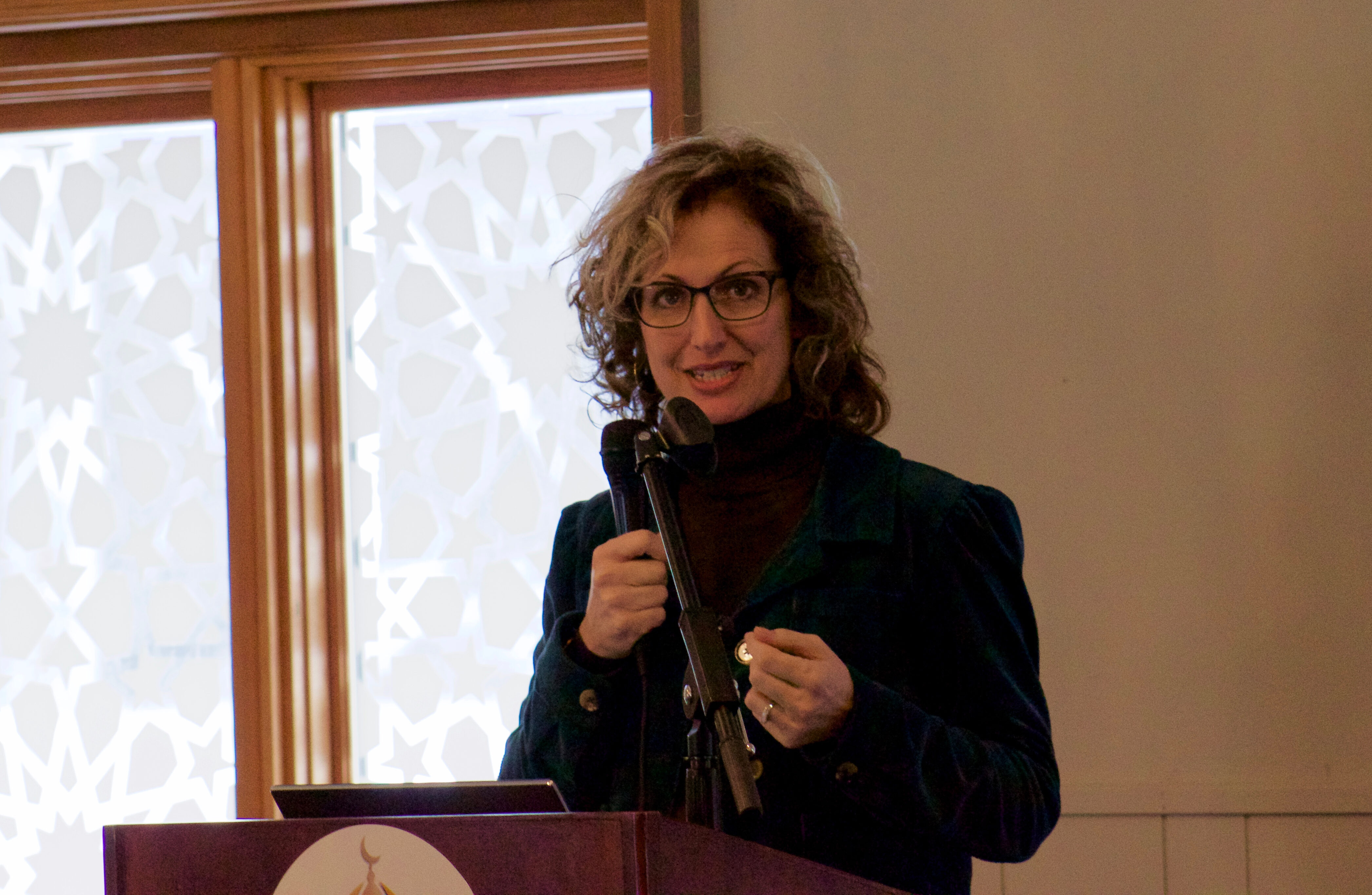 MCCFAD Director Dr. Kristine Ajrouch speaks to community members at the Islamic Institute of America in Dearborn Heights, Saturday, Feb. 15, 2020. Photo: Hassan Abbas/The Arab American News