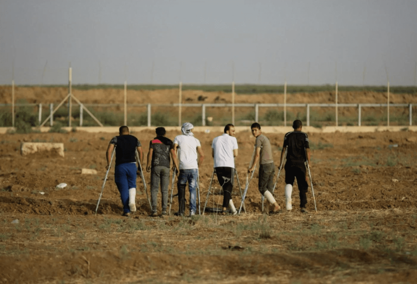 Palestinians shot in the legs by Israeli occupation forces while participating in the Great March of Return protests on Gaza. Photo:Mohammed al-Hajjar/Middle East Eye