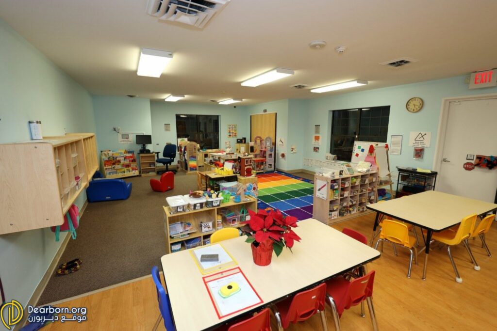 A room inside of the Oakman Child Care West Dearborn facility is pictured. There are tables, play areas, an array of toys, books, and other classroom resources for the children. Photo: Dearborn.org