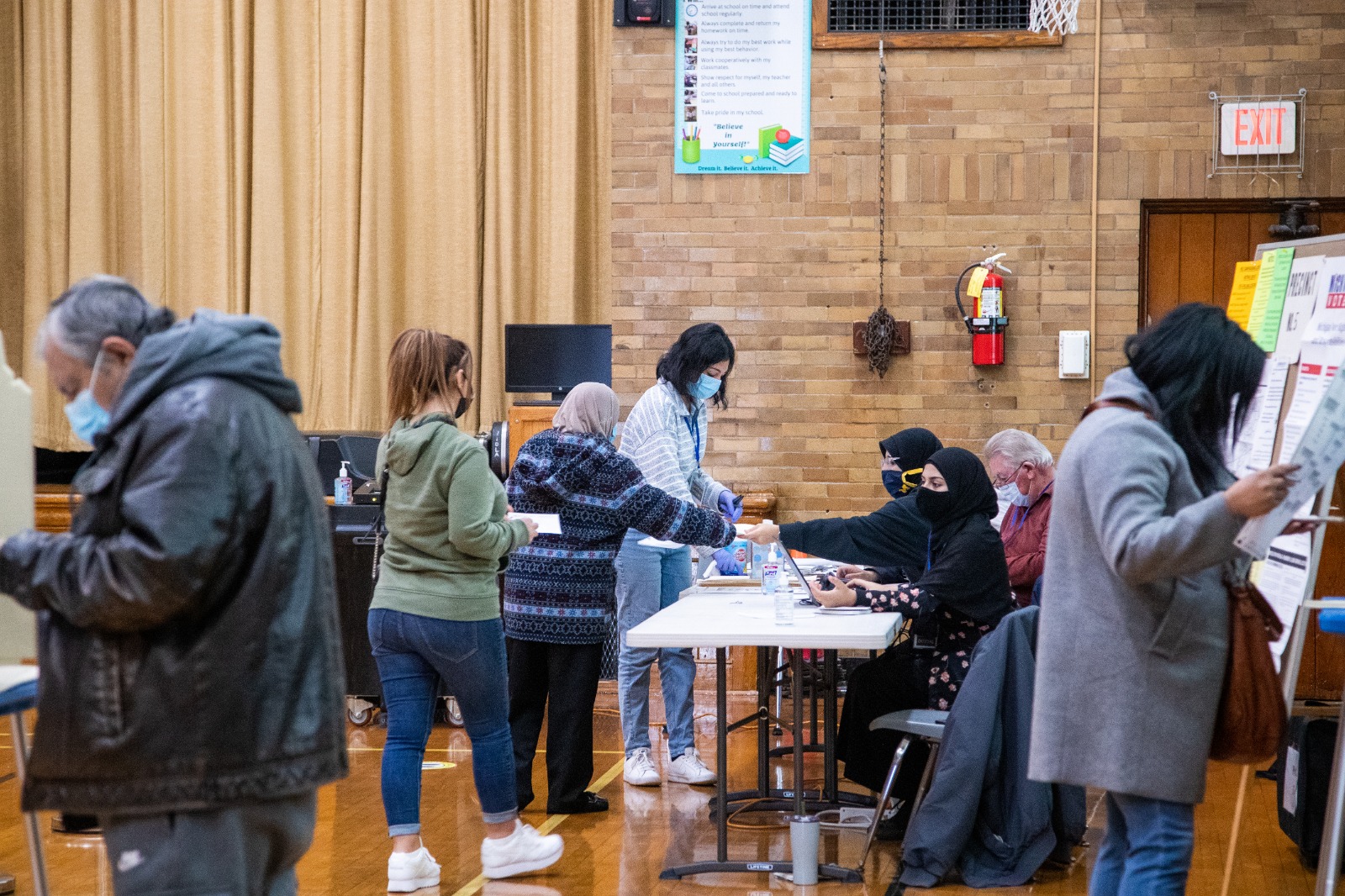 Voters at a precinct in Oakman School in Dearborn, Tuesday, Nov. 3. All photos: Imad Mohamad/The Arab American News