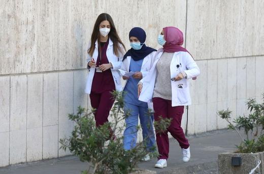 Lebanon’s COVID-19 spike overwhelms battered hospitals and exhausted doctors