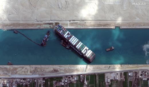 Stuck ship partially freed in the Suez Canal
