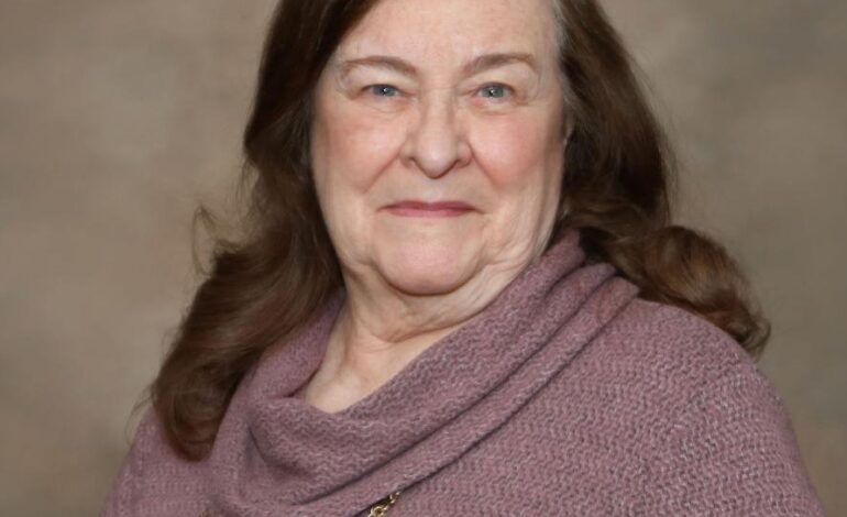 Nancy Bryer puts her name in the hat for a seat on the Dearborn Heights City Council