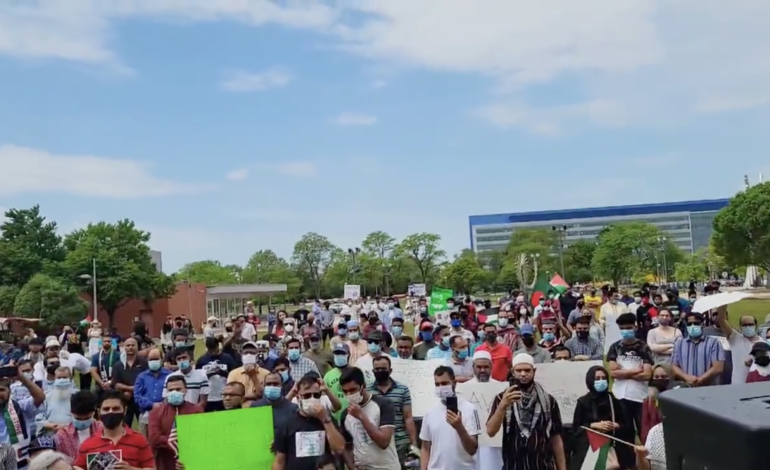 Some 700 protesters rally and march on Sunday, March 23 at Warren City Hall