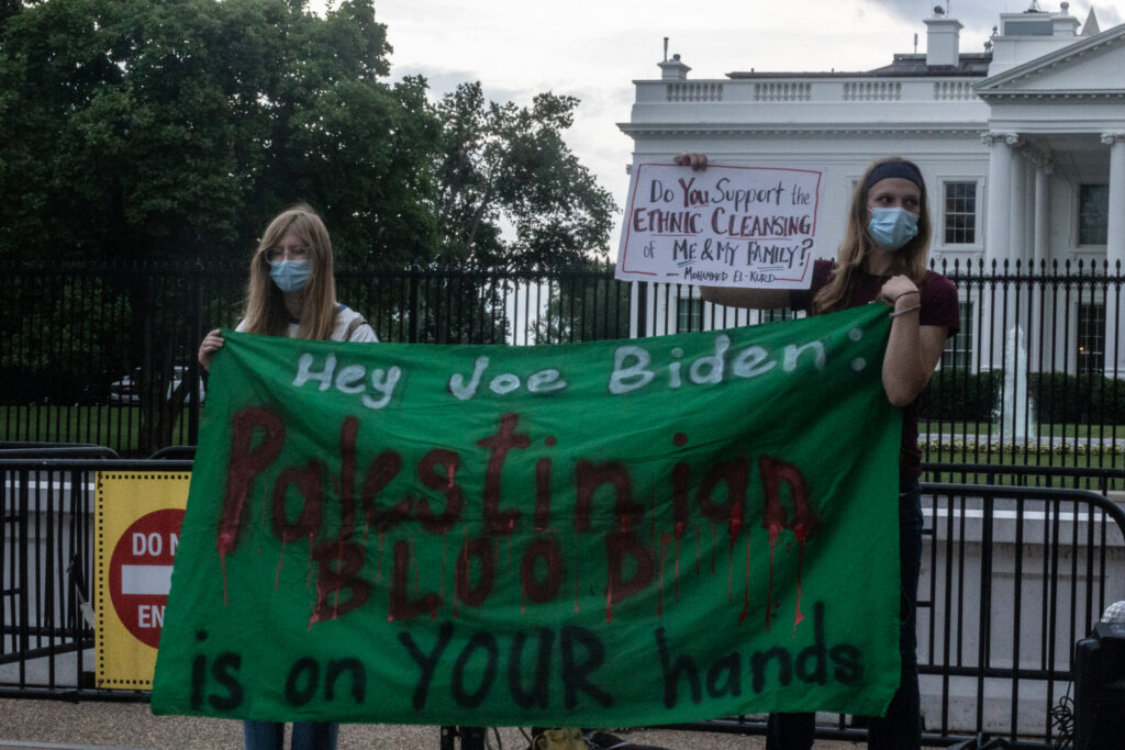 Protestors hold a sign that says "Hey Joe Biden, Palestinian blood is on YOUR hands," outside the White House, June 3. Photo courtesy: Laura Albast