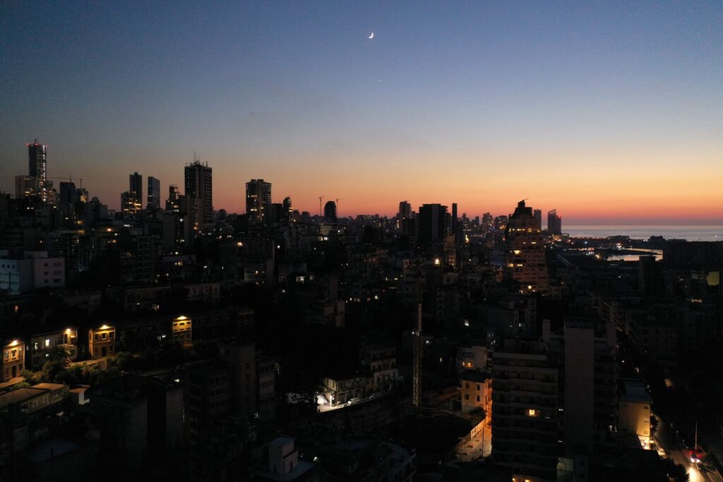 Unlit buildings are seen during a partial blackout in Beirut, Lebanon Aug. 11. Photo: Issam Abdallah/Reuters