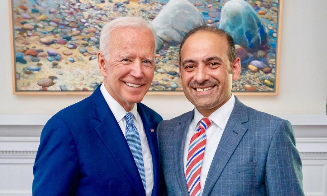 Dilawar Syed poses for a photo with President Biden. Photo via Twitter