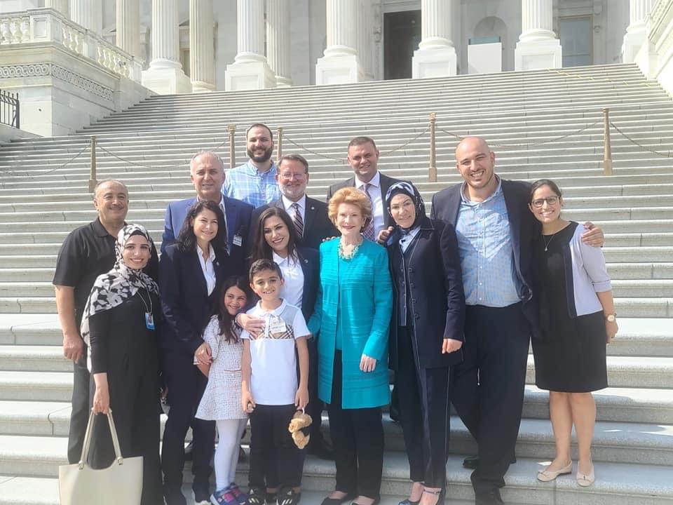Michigan Solicitor General Fadwa Hammoud stands with members of her family and Michigan Attorney General Dana Nessel in front of the U.S. Supreme Court. Photo: Debbie Stabenow's office