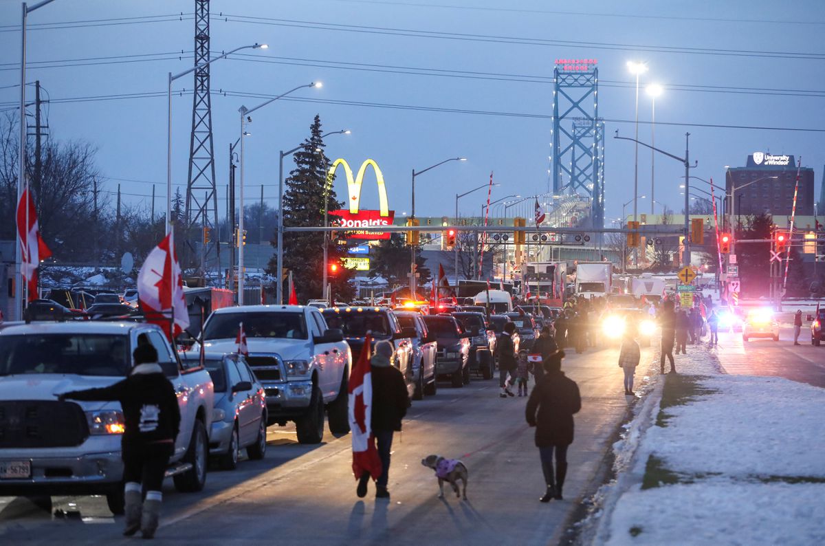 Vehicles block the route leading from the Ambassador Bridge, linking Detroit and Windsor, as truckers and their supporters continue to protest against the COVID-19 vaccine mandates, in Windsor, Canada Feb. 8. Photo: Carlos Osorio/Reuters
