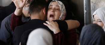 A relative reacts after Israeli forces killed Palestinian Mohammed Assaf during a raid, according to medics, in Nablus, in the Israeli-occupied West Bank, April 13. Photo: Reuters