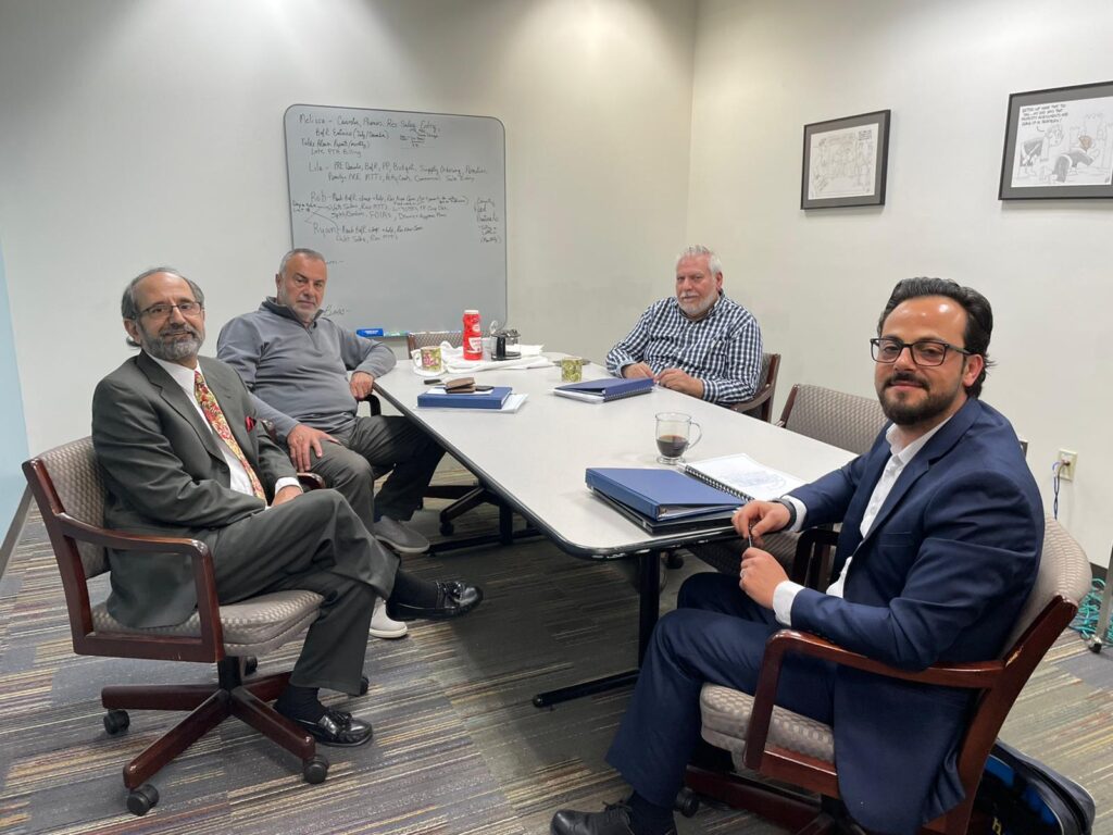 Language Access Committee members Osama Siblani, Dr. Ali Ajami and Kassem Doghman with Dearborn City Clerk George Darany at City Adminstrative Center in Dearborn.