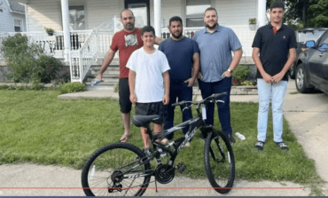 State Rep. Alabas Farhat gifts 12-year-old a new bike to replace his stolen one
