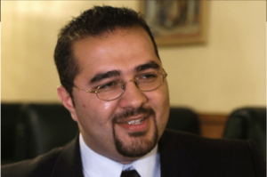 Mohamed Khairullah, a Borough Council member in Prospect Park, N.J., who was appointed mayor, pauses during an interview in Paterson, N.J., July 30, 2004. A lawsuit filed by (CAIR) an Islamic civil rights group challenges the constitutionality of the government’s terror watchlist and says Muslims face negative repercussions even after they are able to clear their name off the list. One of the plaintiffs in the case is Mohamed Khairullah. He thought he had been cleared from the list in 2021, only to find that the Secret Service would not let him attend a White House event earlier this year. – Photo by AP