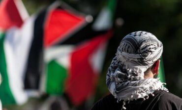 U.S. sales of Palestinian keffiyehs soar, even as wearers targeted