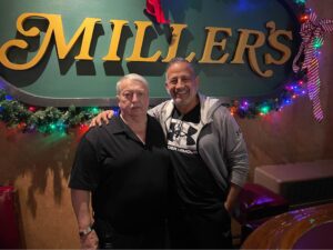 Mark Miller, the previous owner of Miller Bar and to his left Allie Mallad, the new owner. - Photo courtesy of Miller Bar