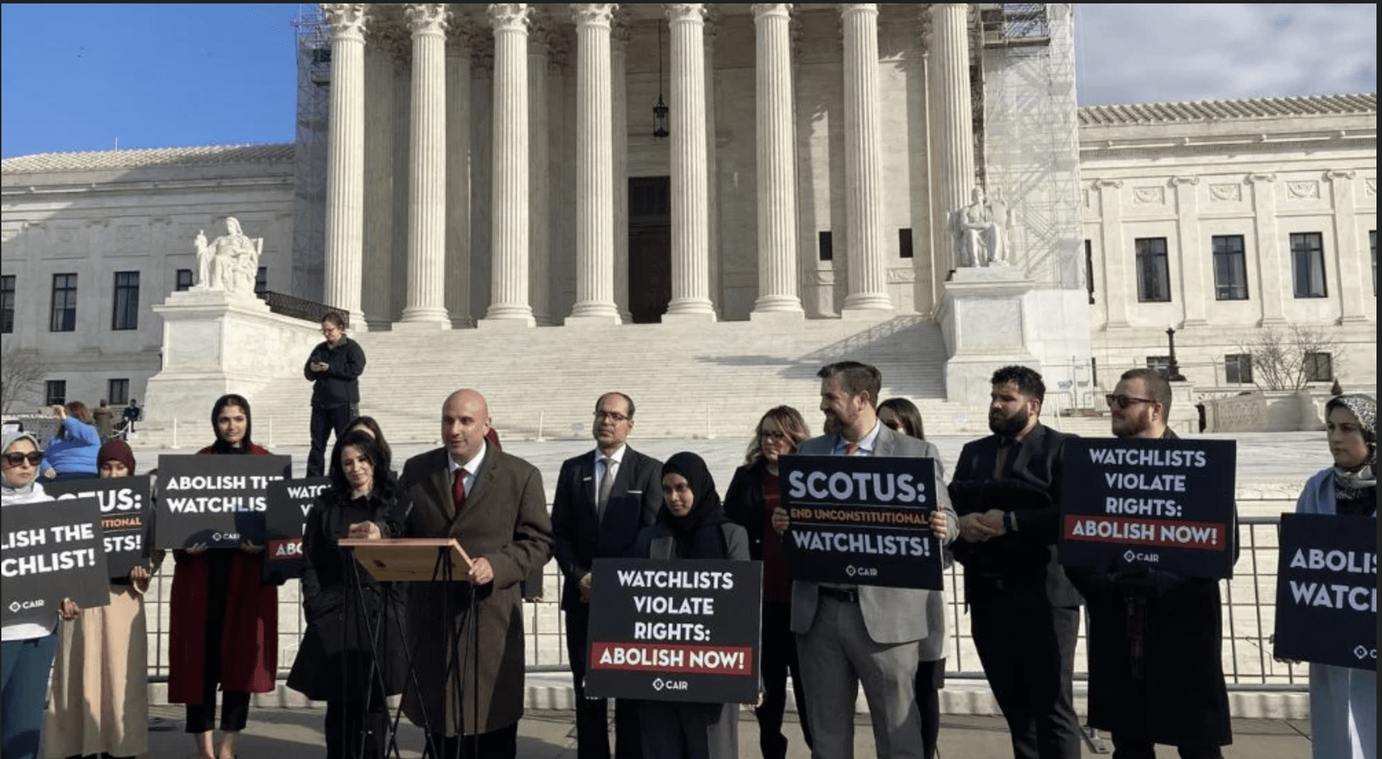 In front of the Supreme Court in Washington, D.C. is CAIR National Deputy Litigation Director Gadeir Abbas, who argued the case for Yonas Fikre before the Supreme Court on January 8, speaking to the media and to his right is CAIR National Litigation Director Lena Masri and standing behind him is CAIR National Executive Director Nihad Awad surrounded by supporters. - Photo courtesy of CAIR