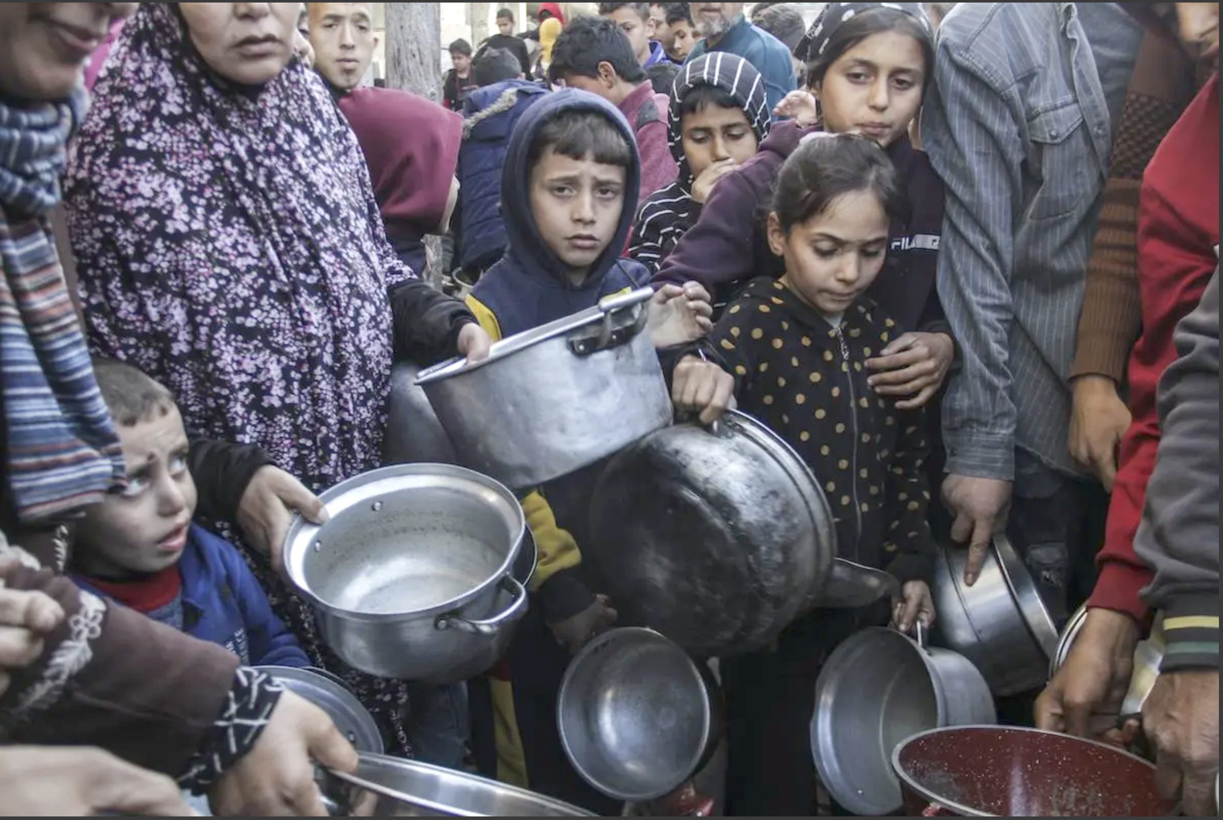 Palestinians break the fast (iftar) under difficult conditions in Jabalia refugee camp on the first day of the Muslim holy month of Ramadan in Gaza on March 11