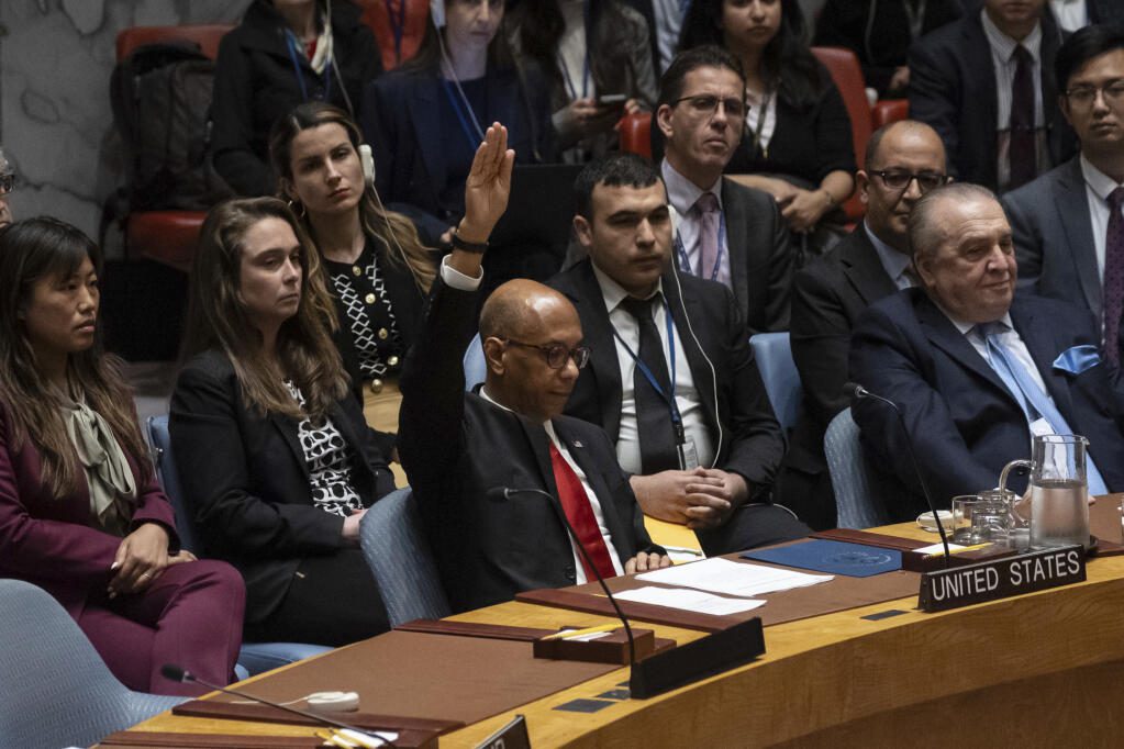 U.S. Deputy Ambassador Robert Wood votes against resolution during a Security Council meeting at United Nations headquarters, Thursday, April 18. – Photo by AP