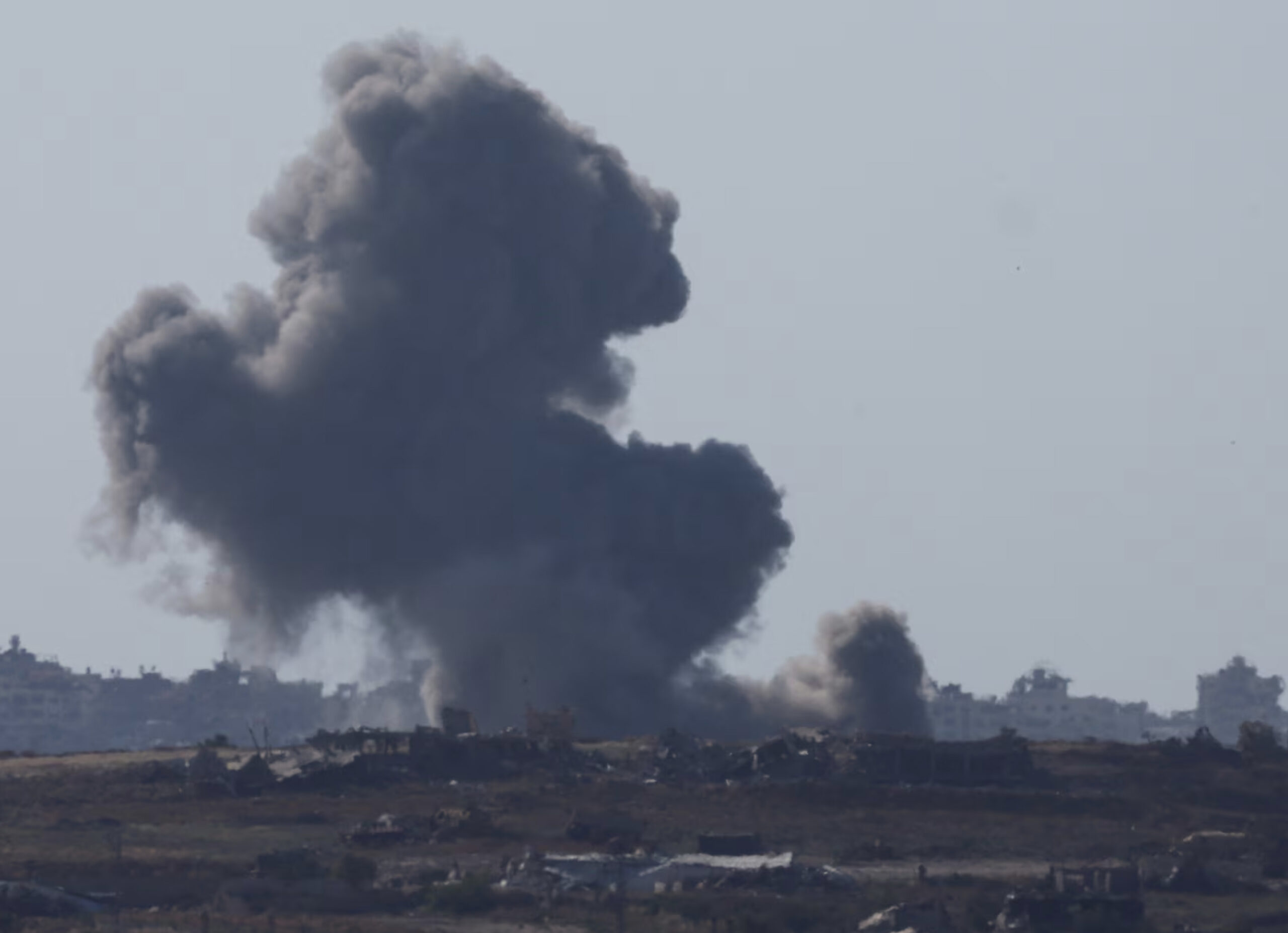 Smoke rises from an explosion following an Israeli airstrike in northern Gaza, near the Israel-Gaza border, amid the ongoing conflict between Israel and the Palestinian Islamist group Hamas, as seen from Israel, May 15. – Reuters