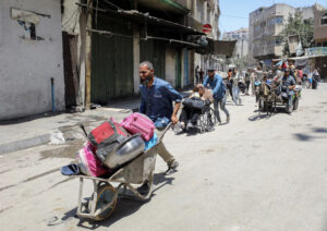 Palestinians flee their homes following an Israeli military operation in Shejaiya, amid Israel-Hamas conflict, in Gaza City, June 27, 2024. – Photo by Reuters