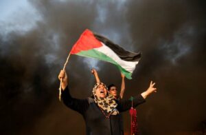 A Palestinian woman shouts slogans during a March of Return protest at the border fence between Israel and Gaza, east of Gaza City August 31, 2018 .– File photo from Reuters