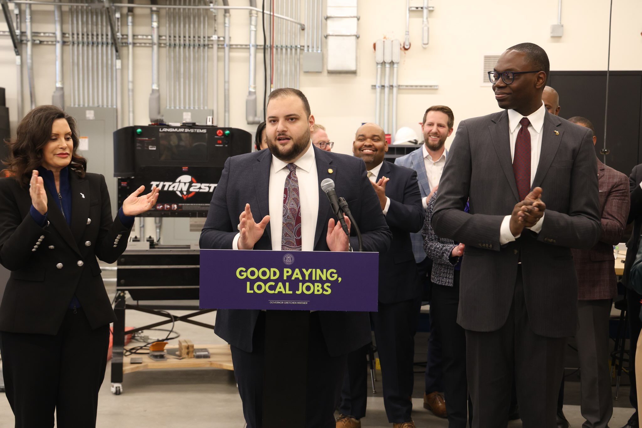 Rep. Alabas Farhat speaks at a press conference flanked by Governor Whitmer and Lt. Governor Gilchrist. – File photo