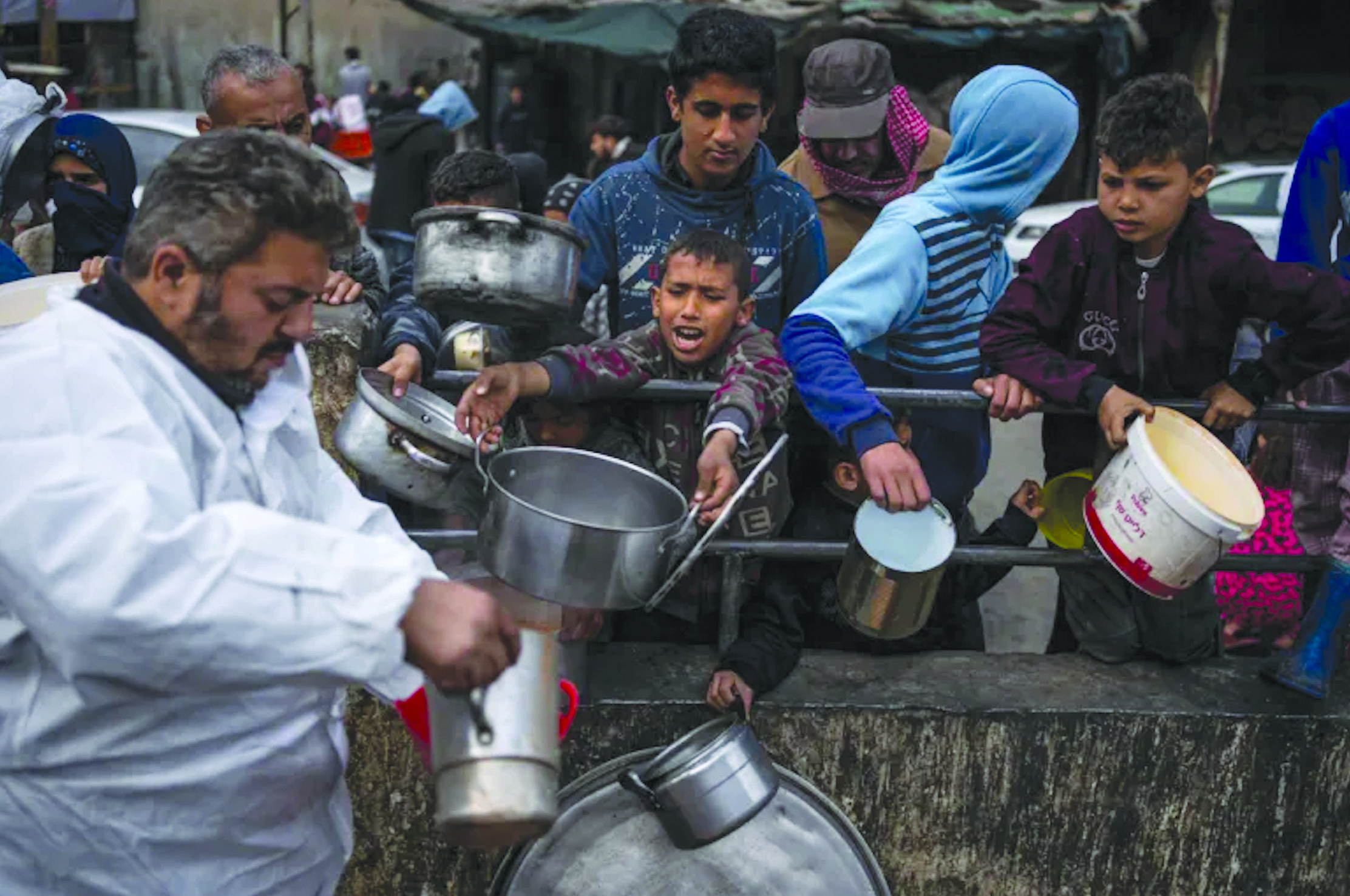 Palestinians line up for food in Rafah, Gaza Strip, February 23, 2024. – File photo