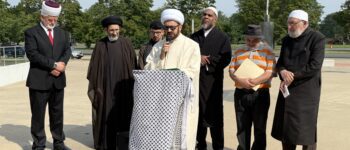 Imam Mohammad Ali Elahi speaking at the press conference.