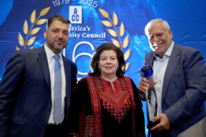 Odie Fakhouri (from left), Dr. Haifa Fakhouri and The Arab American News Publisher Osama Siblani