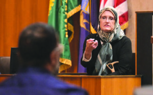 Linda Murray confirms during the trial that she recognized one of the defendants accused of killing her husband.