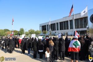 Rally in support of the victims' families at the Henry Ford Centenial Library, Saturday, Sept. 27. – Photos by Dearborn.org