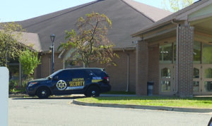 A security vehicle parked in front of the Islamic Institute of America in Dearborn Heights. 